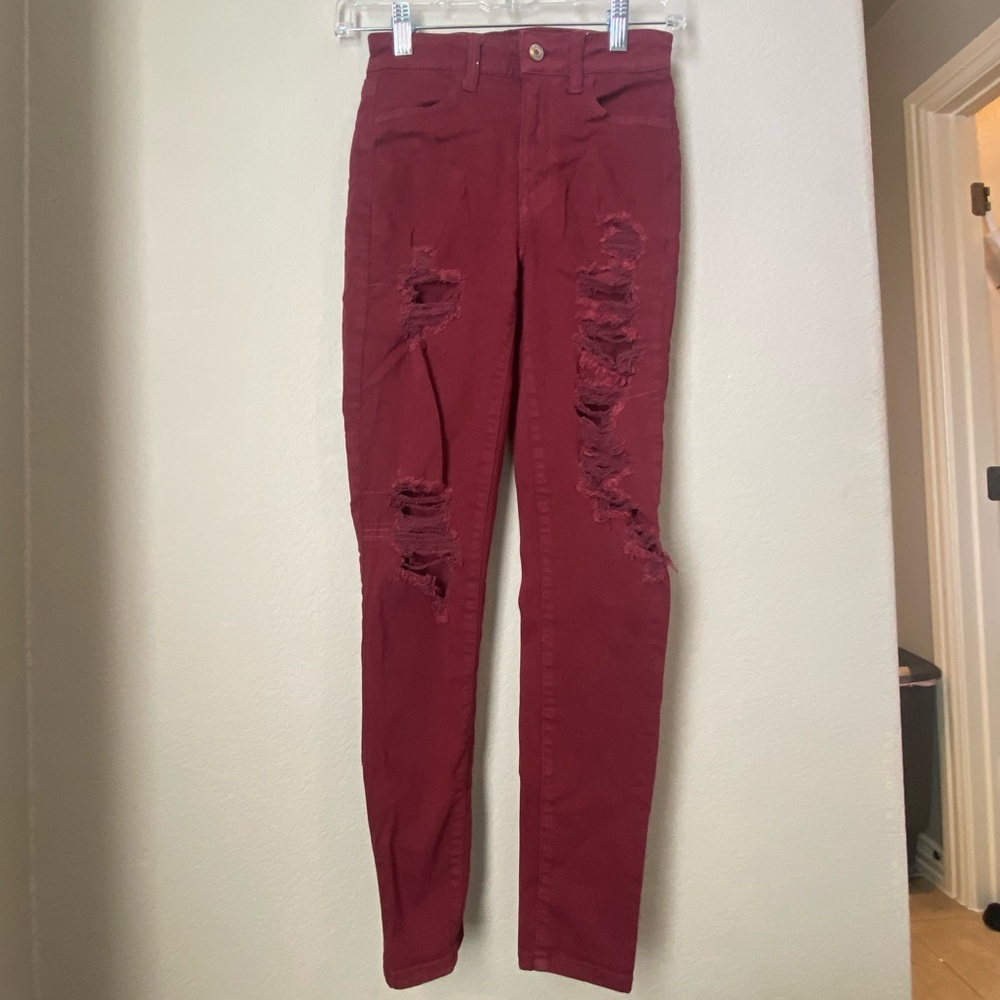 Burgundy American eagle ripped skinny jeans - size 0